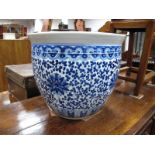 A Large Blue and White Oriental Pottery Planter, of circular form with allover floral decoration,