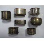 Seven Assorted Hallmarked Silver and Other Napkin Rings, (various makers/dates) including engraved