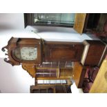 A XIX Century Mahogany and Oak Longcase Clock, with swan neck canopy, turned spindles to hood,