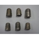Five Hallmarked Silver Thimbles, including Chester Assay; together with another stamped "Sterling
