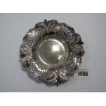 A Hallmarked Silver Dish, the wide pierced rim detailed in relief, 14cm diameter.