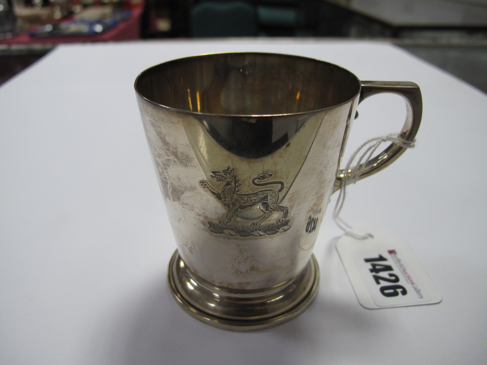 A Hallmarked Silver Mug, Wakely & Wheeler, London 1943, of plain tapering cylindrical form, crested,