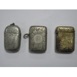 Three Plated Vesta Cases, each with engraved leaf and leaf scroll decoration. (3)