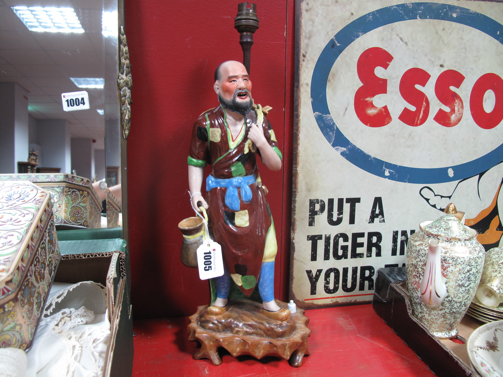 A Ceramic Oriental Gentleman as a Table Lamp, on hardwood base.