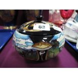 A Moorcroft Pottery Circular Lidded Pot, painted in the 'Bredon Hill' (Evesam) pattern designed by