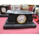 A Black Slate Mantel Clock, of Architectural form, fluted decoration on a plinth base, white