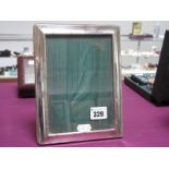 A Hallmarked Silver Mounted Rectangular Photograph Frame, HS, Sheffield 1993, with ribbon and reed