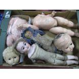 A Porcelain Headed Doll Stamped 'Alma' 5/10, badly damaged with leather body plus composition headed