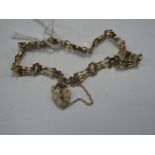 A Dainty Gate Link Style Bracelet, to 9ct gold heart shape padlock clasp.