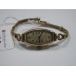A Chester Hallmarked 9ct Gold Cased Ladies Wristwatch, the dial with black Arabic numerals, within