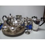 A Plated Four Piece Tea Set, bottle holder, a matching teapot and hot water pot, servers, spoons,