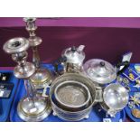 A Plated Four Piece Tea Set, together with a pair of candlesticks, a bottle coaster, salver etc:-