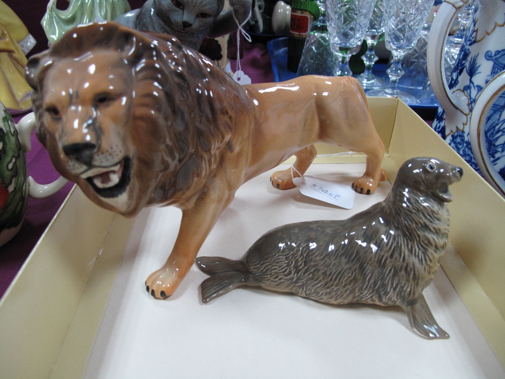 A Beswick Pottery Figure of a Lion (Facing Left), model no. 2089, and Seal no. 1534. (2)