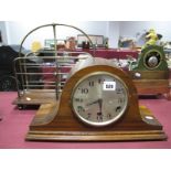 A 1920's Walnut Cased Musical Mantel Clock; together with an early XX Century gilded brass two