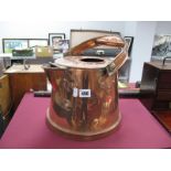 A XIX Century Copper Pouring Vessel with Art Nouveau riveted mounts to fall handle, 32cm wide.