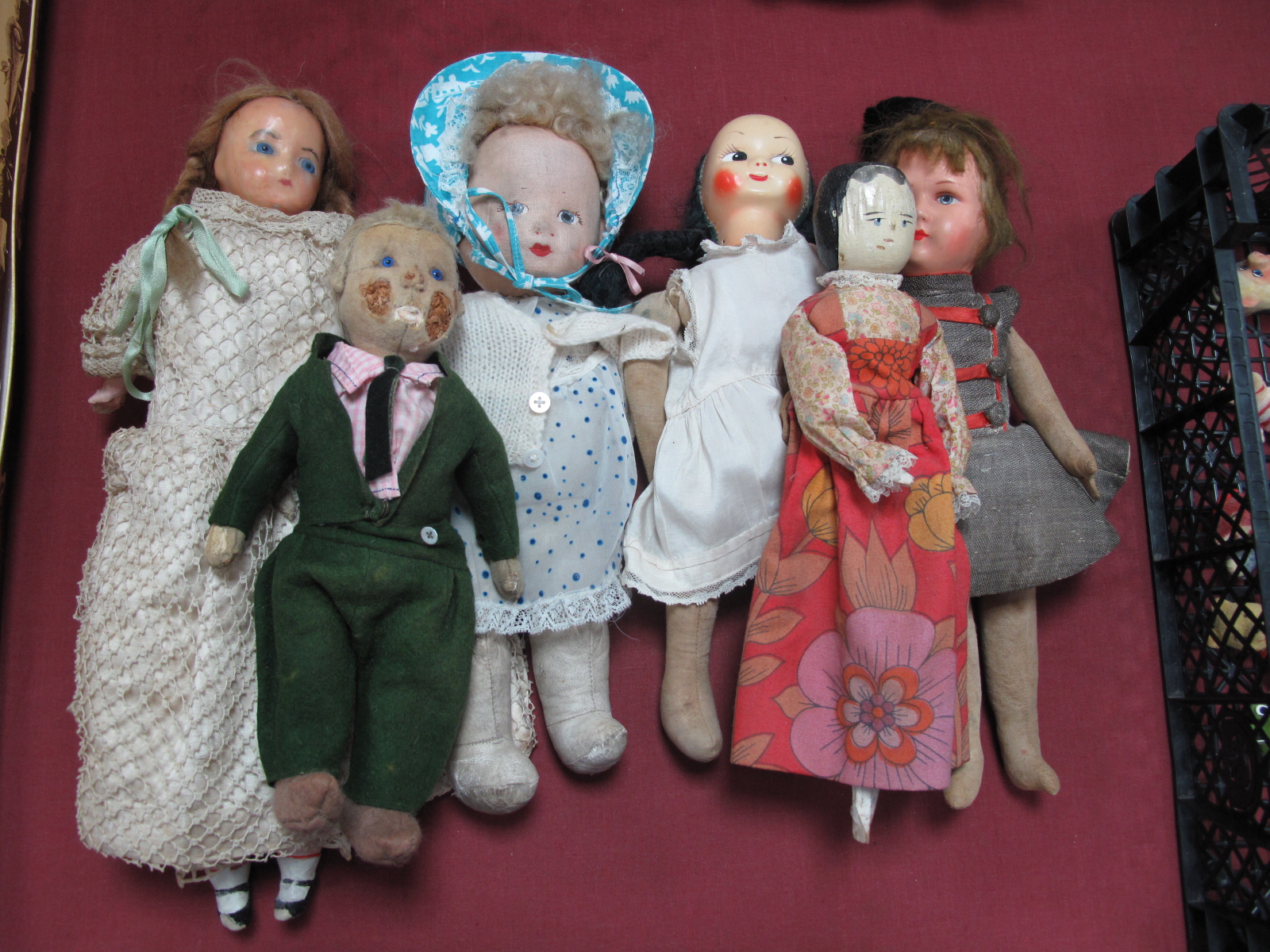 A Quantity of XX Century Dolls, including cloth, felt, wax, wooden, all showing signs of wear.