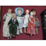 A Quantity of XX Century Dolls, including cloth, felt, wax, wooden, all showing signs of wear.