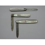 Three Hallmarked Silver and Mother of Pearl Folding Fruit Knives, one with decorative scales