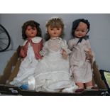 Three Mid XX Century Composition Dolls, with sleepy eyes, moving limbs, 58cm high.