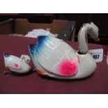 A Mid XX Century Tinplate Japanese Clockwork Toy of a Swan and Cygnet.