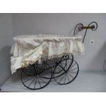 A Modern Victorian Style Dolls Pram.