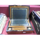 A XIX Century Walnut Brass Bound Writing Box, with fitted interior.