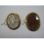 A Large XIX Century Polished Hardstone Panel Brooch, collet set within textured border; together