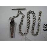 A Graduated Curb Link Albert Chain, to swivel style clasp, suspending T-bar and a hallmarked