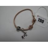 Pandora; A Modern Rose Coloured Bracelet, stamped "R1 ALE R", with two sliding bead charms,