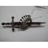 A Victorian Bohemian Garnet Sword Brooch, designed as a sword piercing a coronet, set throughout