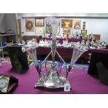 A James Deakin & Sons Plated Epergne, the removable central glass flute with scroll supports and