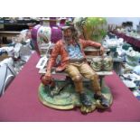 Capodimonte Pottery Figurine of Gentleman With Hotel Splendide Case, by Volta.