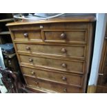 A Mid XIX Century Mahogany Chest of Drawers, top with a moulded edge, two small drawers, four long