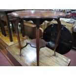 An Edwardian Walnut Window Table, with a shaped top, cabriole legs, with under shelf.