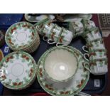 An Edwardian China Part Tea Service, comprising ten cups, twelve saucers and tea plates, bread and