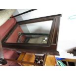 A Rectangular Bevelled Glass Overmantel Mirror, in stained hardwood frame; a mahogany oval coffee