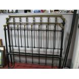A Circa Late XIX Century Cast Iron Double Bedstead, with brass top rail and spindles.