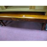 A Modern Hardwood Coffee Table, rectangular form, moulded edge, squared tapering feet.