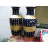 A Pair of Blue and Gilt Chinese Effect Pottery Vases, 61.5cm high