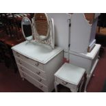 A White Painted Chest of Drawers, three drawers on cabriole legs together with a white painted