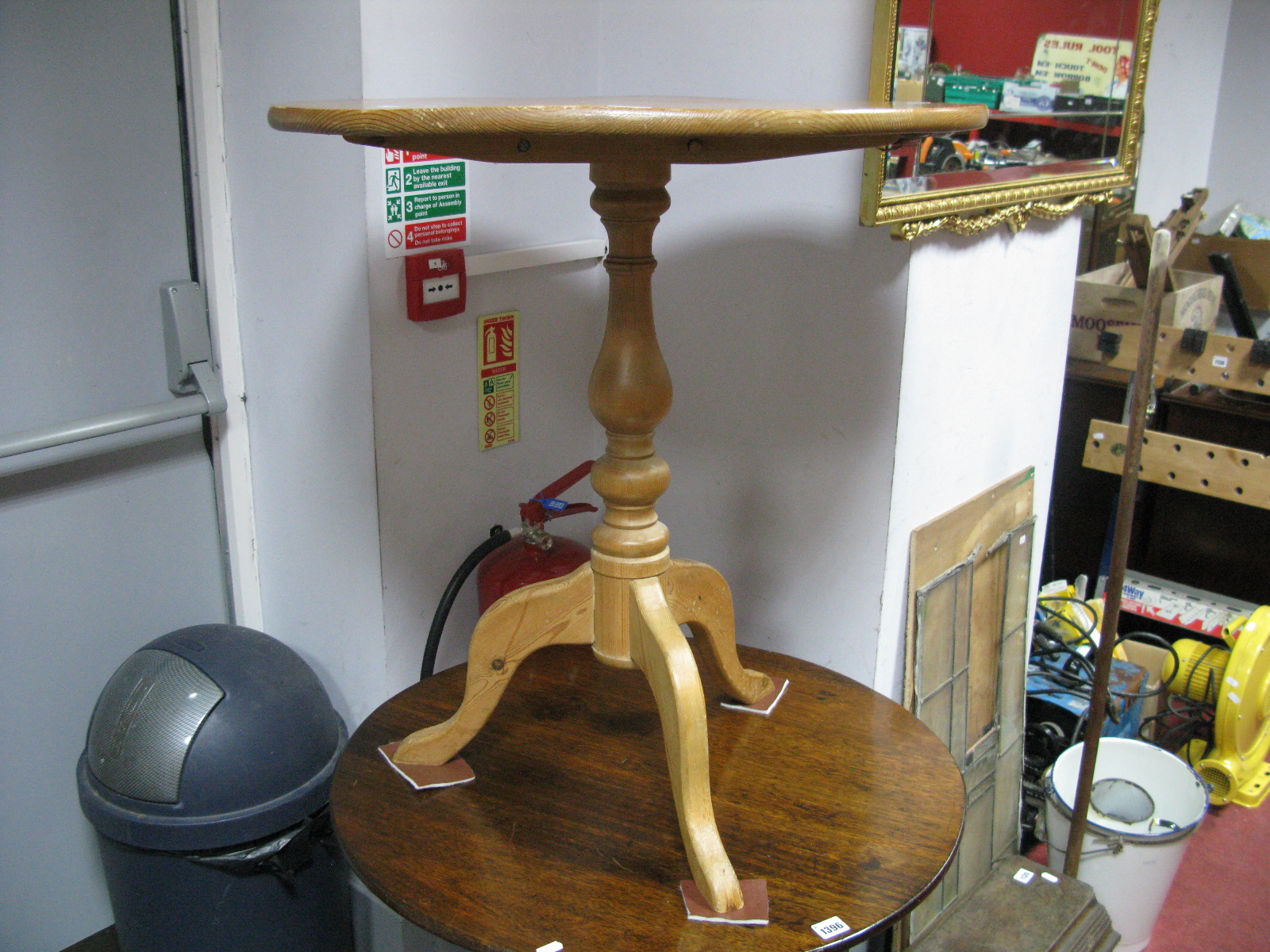 A Pine Pedestal Table, with circular top, turned support on tripod legs, 68cm diameter.