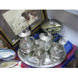 A 'Craftsman' Hammered Pewter Five Piece Tea Service. incorporating oval tray; plated comport, glass