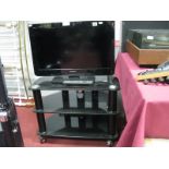 A Panasonic Viera 24" Flatscreen Television, with remote control and stand. (3)