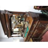 A Late XIX Century Walnut Sideboard, with egg and dart carving to shaped mirror back, stepped