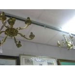 A Brass Six Branch Ceiling Light, with scroll decoration and acorn finial, a smaller three branch