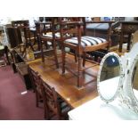 An Oak Refectory Table, on turned and block supports; together with a set of six ladder back