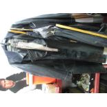 Two Mid XX Century Black PVC Fishing Coats by Yarmouth and Diamond Maxron, an associated cap,