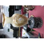 A Large Onyx Vase, of ovoid form, figured neck, on circular spreading foot, 42cm high, and a