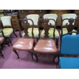 A Set of Six Walnut Dining Chairs, with a shaped top rail with shell decoration, shaped splat,