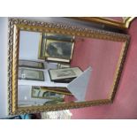 A Rectangular Bevelled Wall Mirror, in gilt frame.